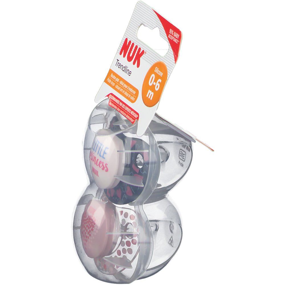 Due ciucci in confezione trasparente. Scritte: NUK, Trendline, 0-6 m, Little Princess. Confezione con gancio.