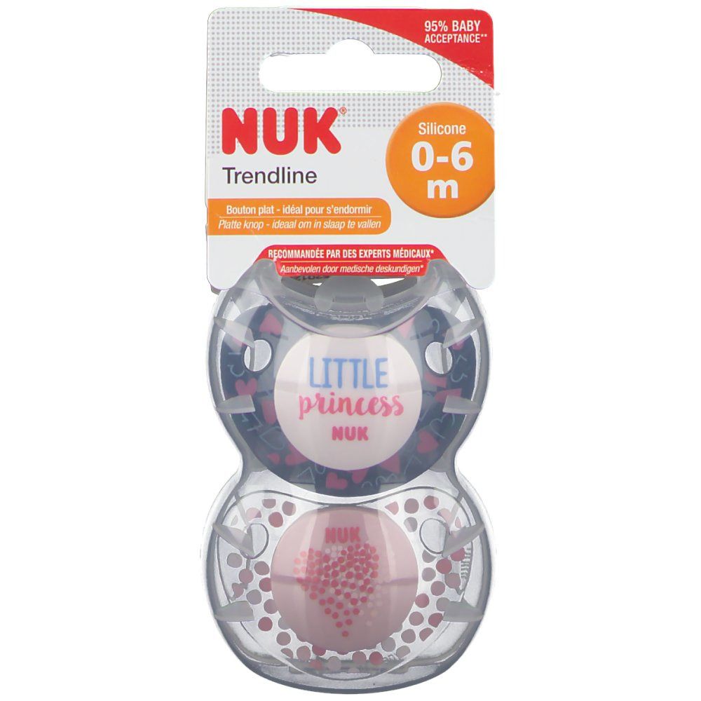 Due ciucci in confezione trasparente. Scritte: NUK, Trendline, 0-6 m, Little Princess. Confezione con gancio.