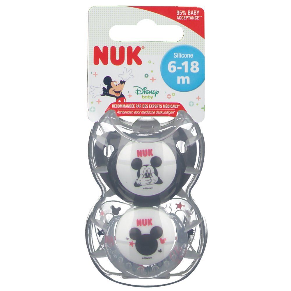 Due ciucci Mickey Mouse in confezione trasparente. La confezione mostra il logo NUK e l'indicazione dell'età.