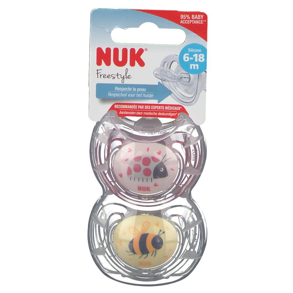 Due succhietti NUK Freestyle, 6-18 mesi, in confezione. Motivi ape e coccinella. Silicone.