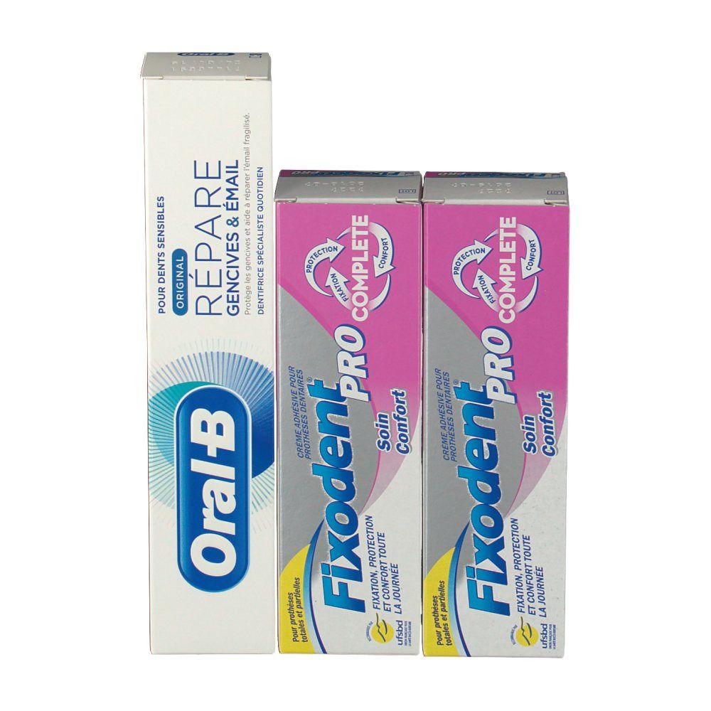 Confezioni di dentifricio e crema adesiva. Dentifricio Oral-B e due confezioni Fixodent Pro Complete. Confezioni rosa e bianche.