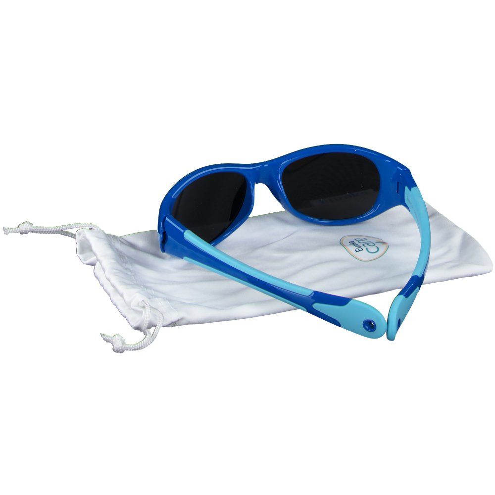 Occhiali da sole blu per bambini con aste azzurre, su sacchetto bianco. Marchio Eureka.