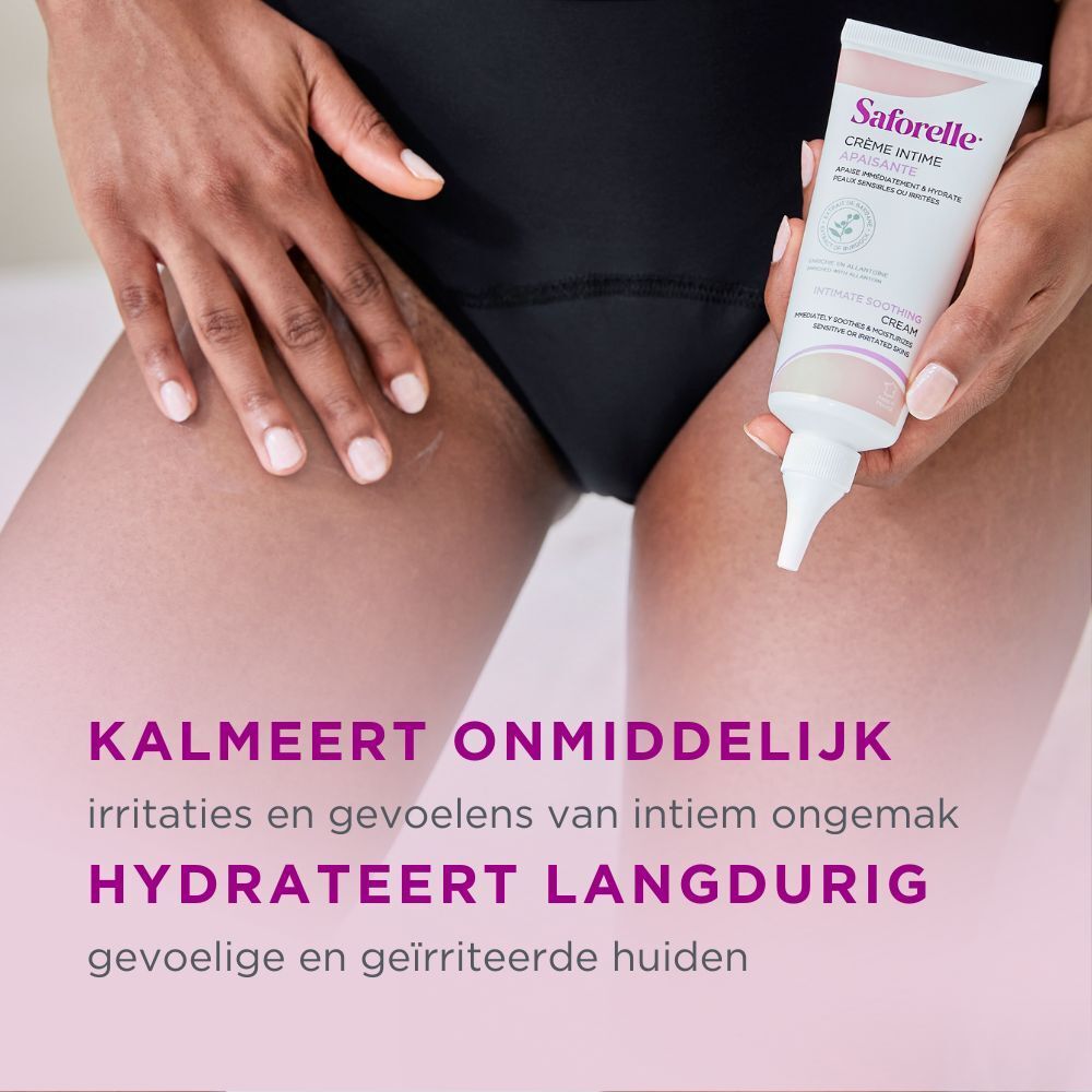 Mani che tengono un tubo di Crema Intima Lenitiva. Testo: Calma immediatamente, idrata a lungo. Sfondo rosa.