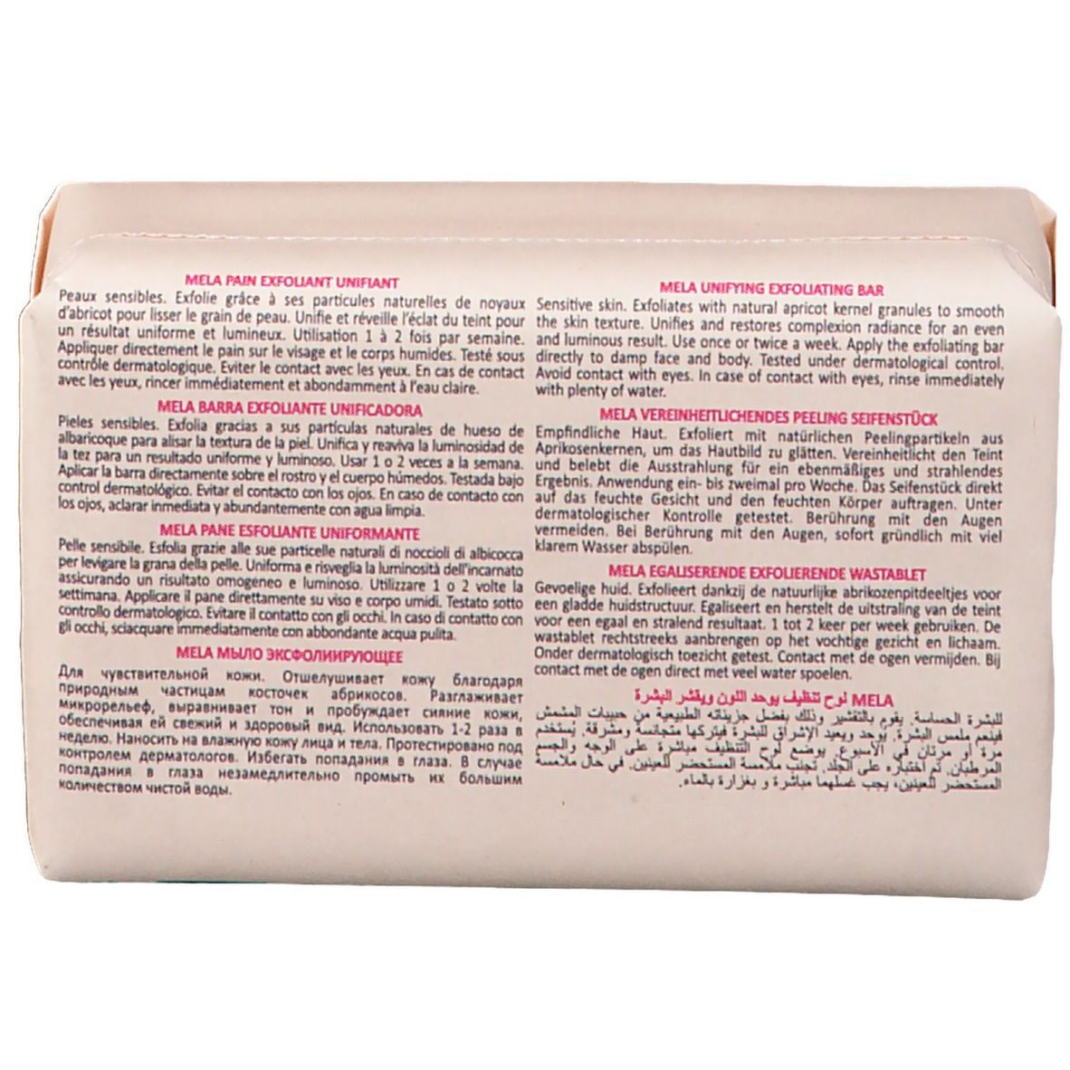 Retro del sapone esfoliante TOPICREM. Testo multilingue. Contiene noccioli di albicocca. Scritta: "Mela Unifying Exfoliating Bar".