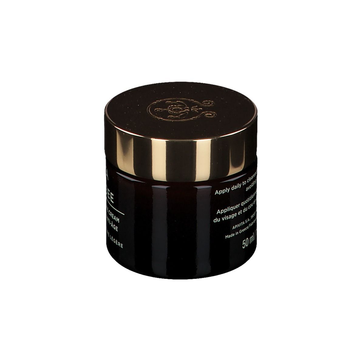 Vaso scuro con coperchio dorato. Scritta: APIVITA Queen Bee. Testo in inglese e francese.