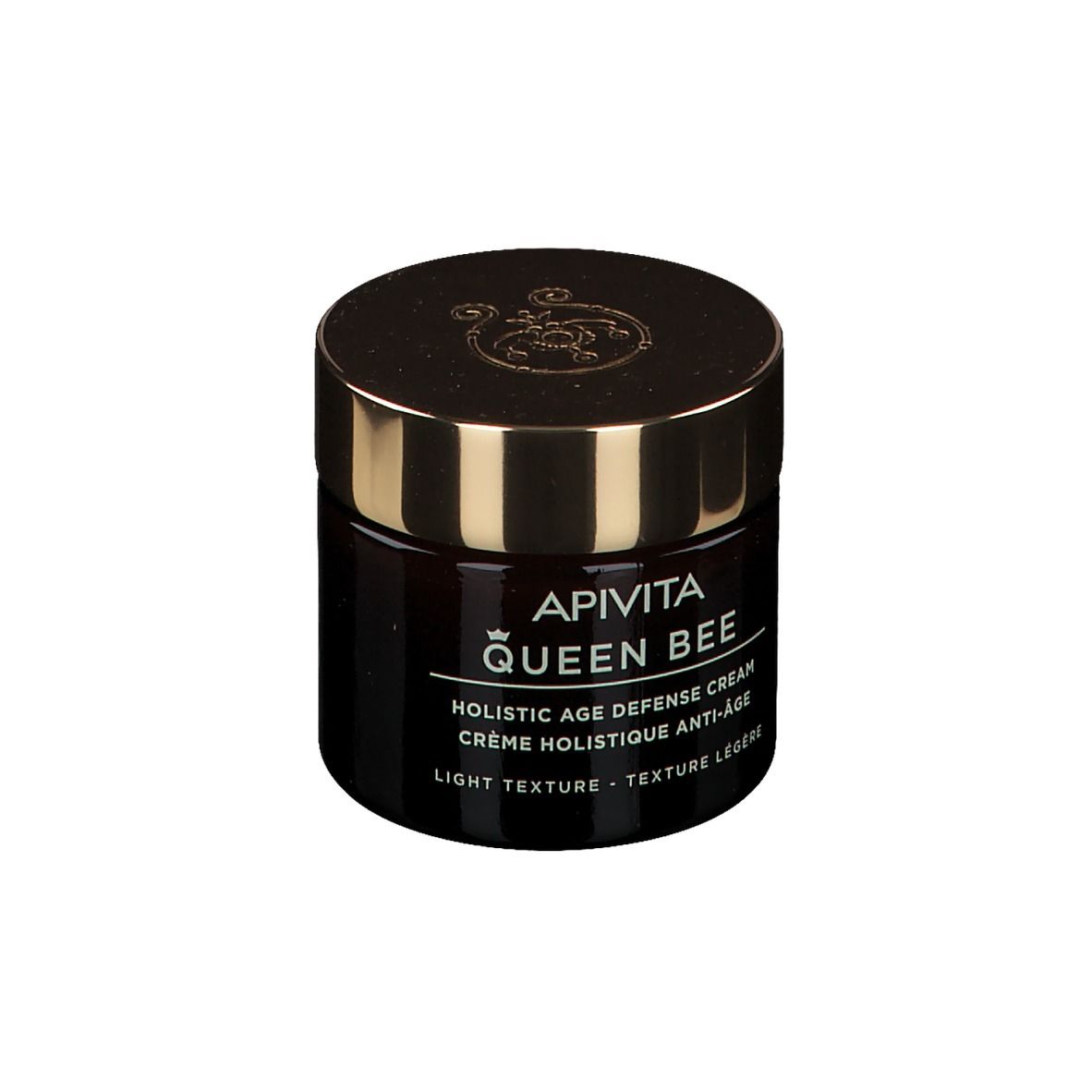 Vaso scuro con coperchio dorato. Scritta: APIVITA Queen Bee. Testo in inglese e francese.