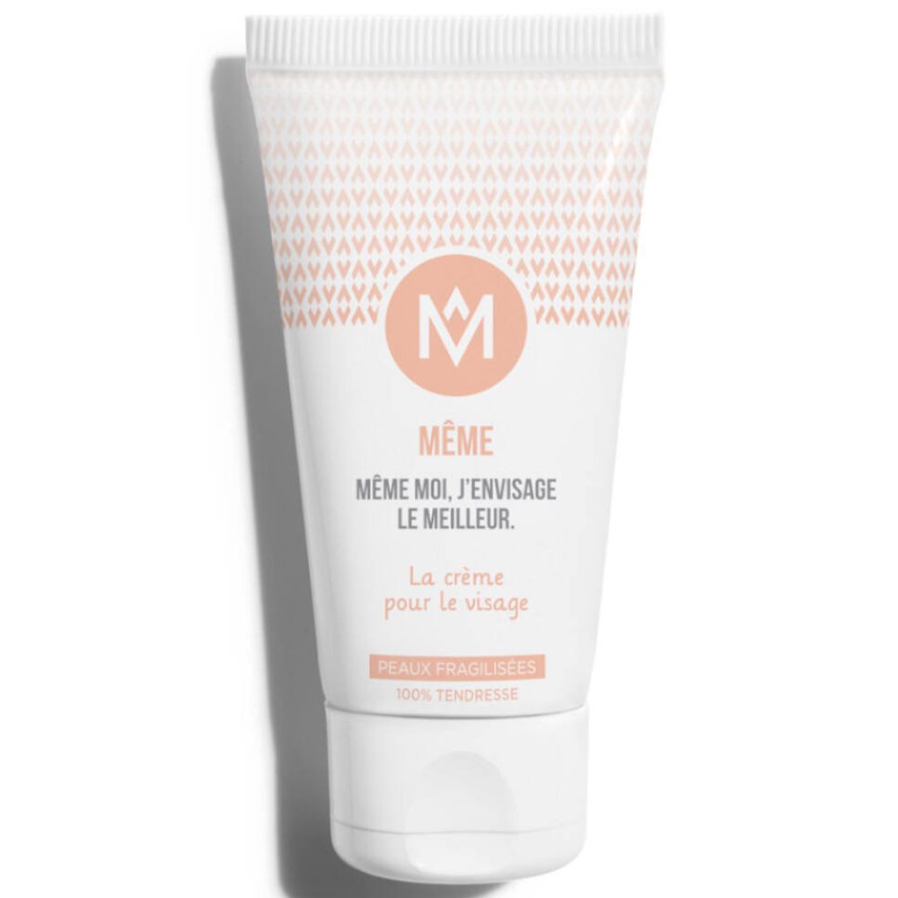 Tubo di crema bianco con logo MÊME e informazioni sul prodotto. Scritta: La crème pour le visage. Peaux fragilisées.