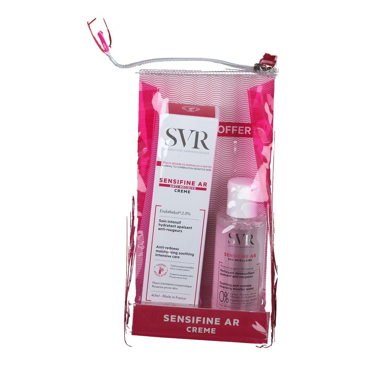 Set in una borsa trasparente rosa. Include una scatola bianca e rossa e una bottiglia trasparente con tappo bianco. Marchio SVR visibile.