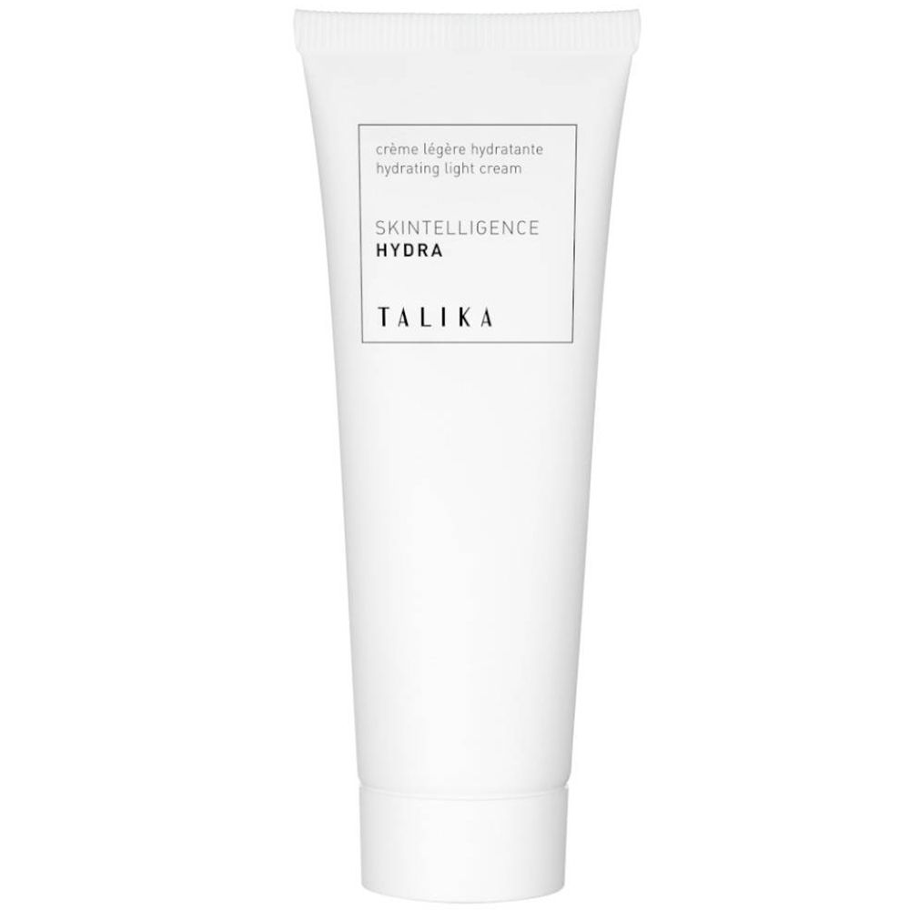 Tubo bianco con testo "TALIKA" e informazioni sul prodotto. Crema giorno e notte.