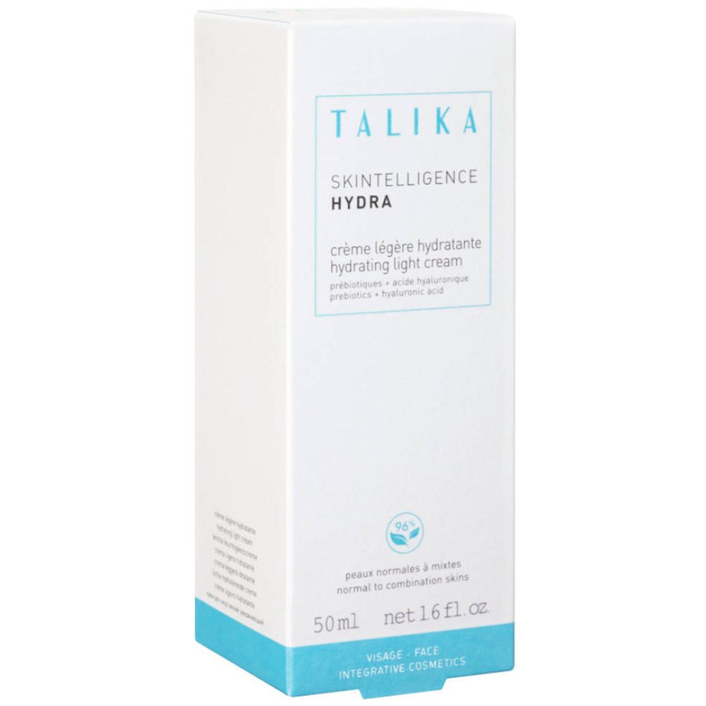 Confezione bianca con informazioni sul prodotto. Testo: "TALIKA", "SKINTELLIGENCE HYDRA", crema.
