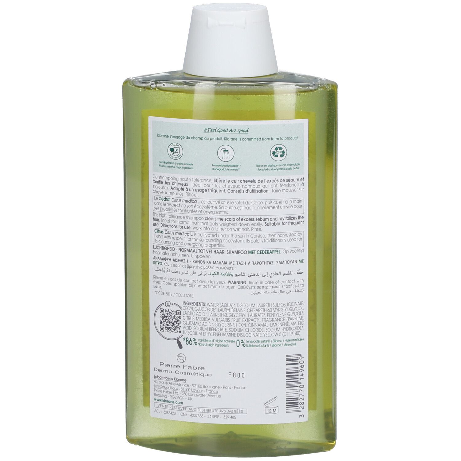 Liquido giallo trasparente in bottiglia trasparente con tappo bianco. Etichetta posteriore con testo e simboli.