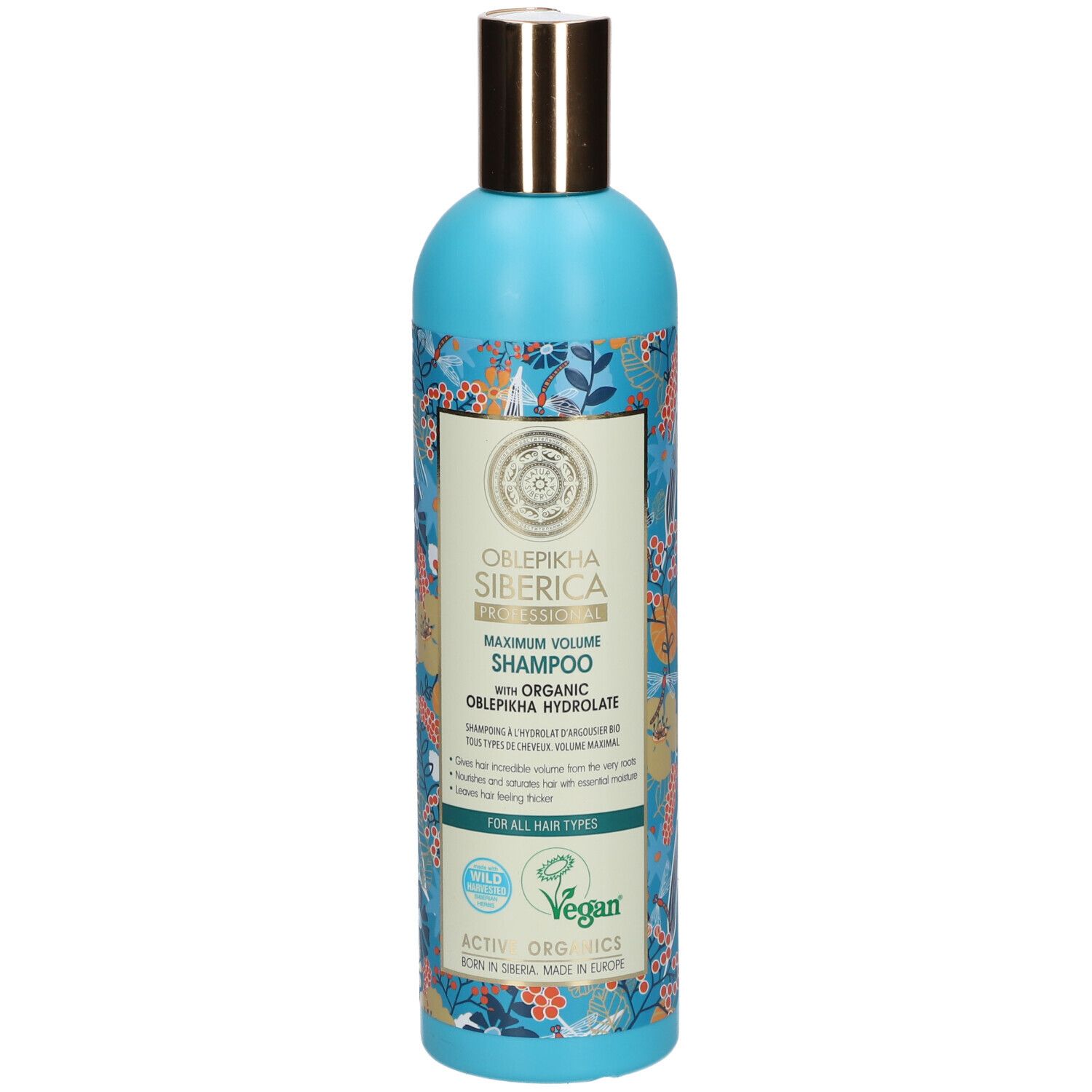 Flacone blu di "Maximum Volume Shampoo" di "Oblepikha Siberica" con tappo dorato. Include sigillo "Vegan".