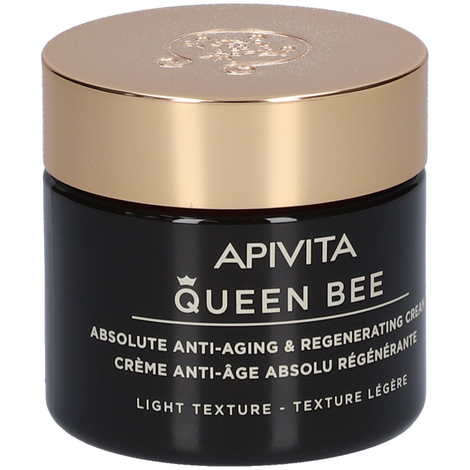 Vaso scuro con coperchio dorato. Scritta: APIVITA QUEEN BEE Absolute Anti-Aging Creme.