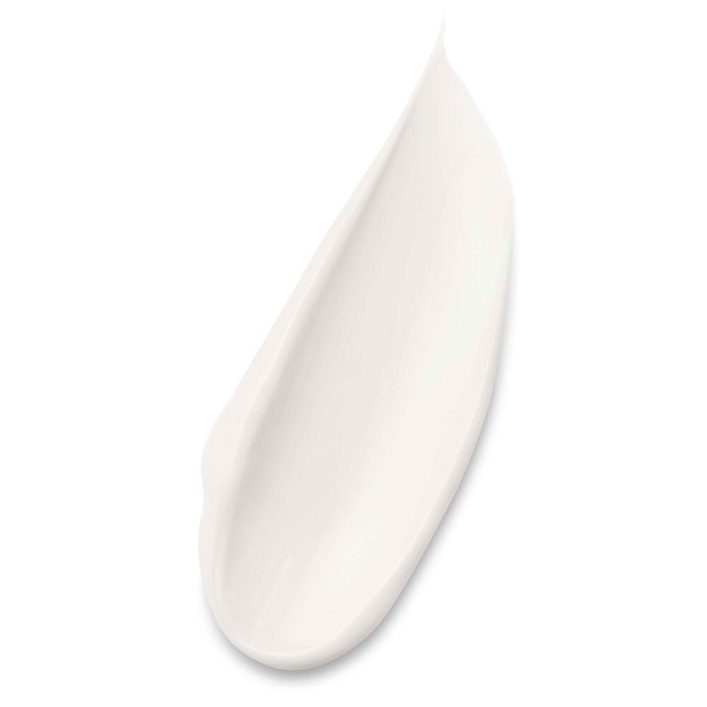 Goccia di crema bianca. Consistenza visibile.