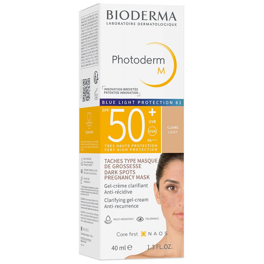 BIODERMA Photoderm M Gel-Crema SPF50+ Teinte Claire. Confezione con prodotto. Donna con macchie pigmentarie.
