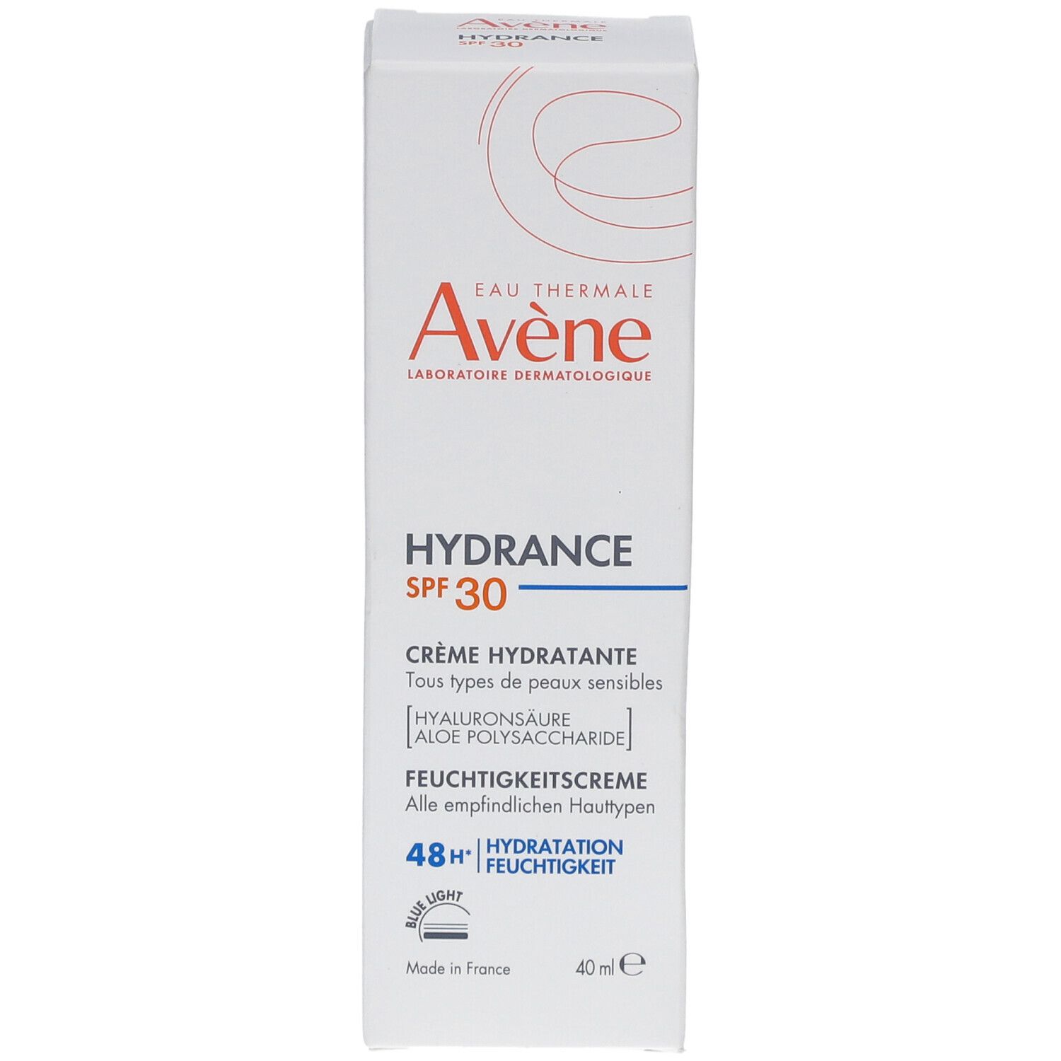 Scatola bianca con informazioni prodotto. Marca Avene, Hydrance SPF 30. Crema per pelli sensibili. Idratazione 48h.