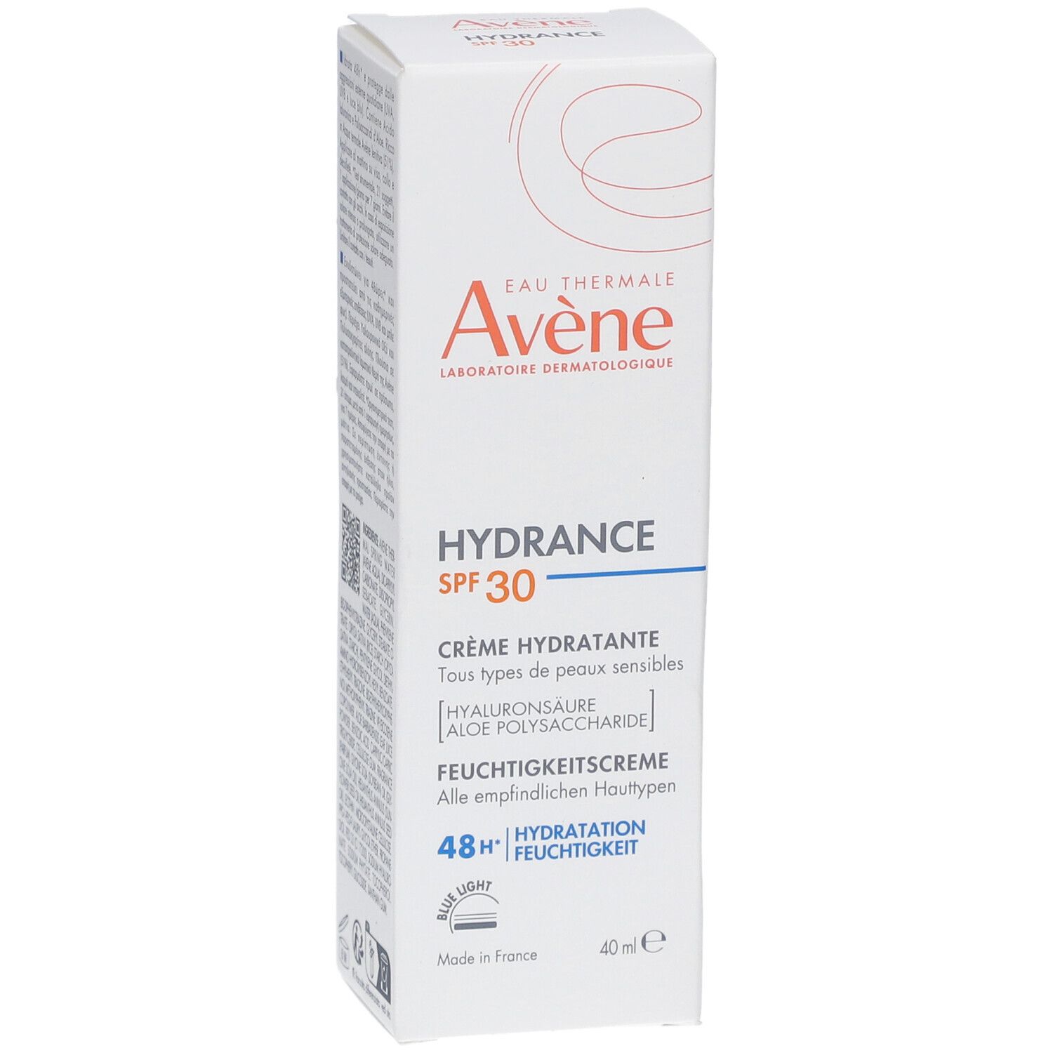 Scatola bianca con informazioni prodotto. Marca Avene, Hydrance SPF 30. Crema per pelli sensibili. Idratazione 48h.