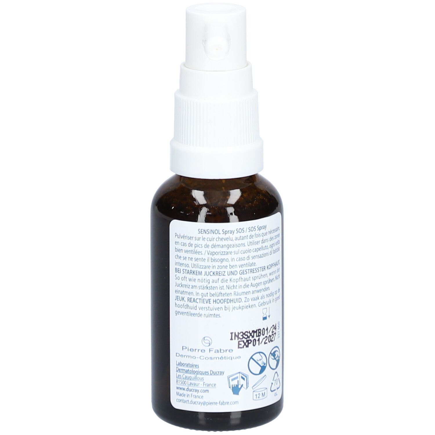 Flacone di vetro marrone con erogatore bianco, vista posteriore. Scritta: Sensinol Spray SOS, Ducray.