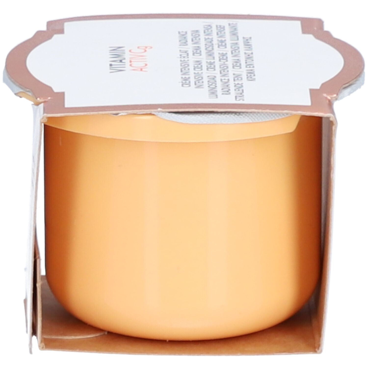 Vasetto di crema beige. Scritta: Vitamin Activ Cg. Coperchio con scritta.
