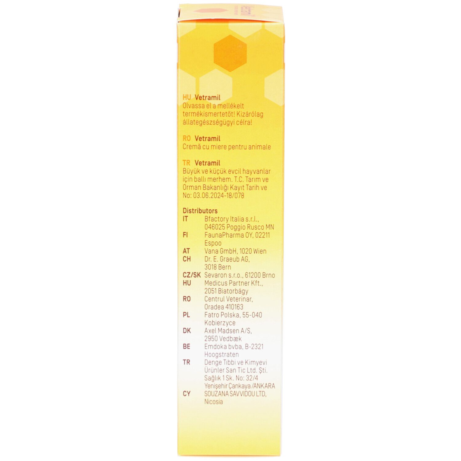 Lato della scatola gialla. Elenco dei distributori in diversi paesi.