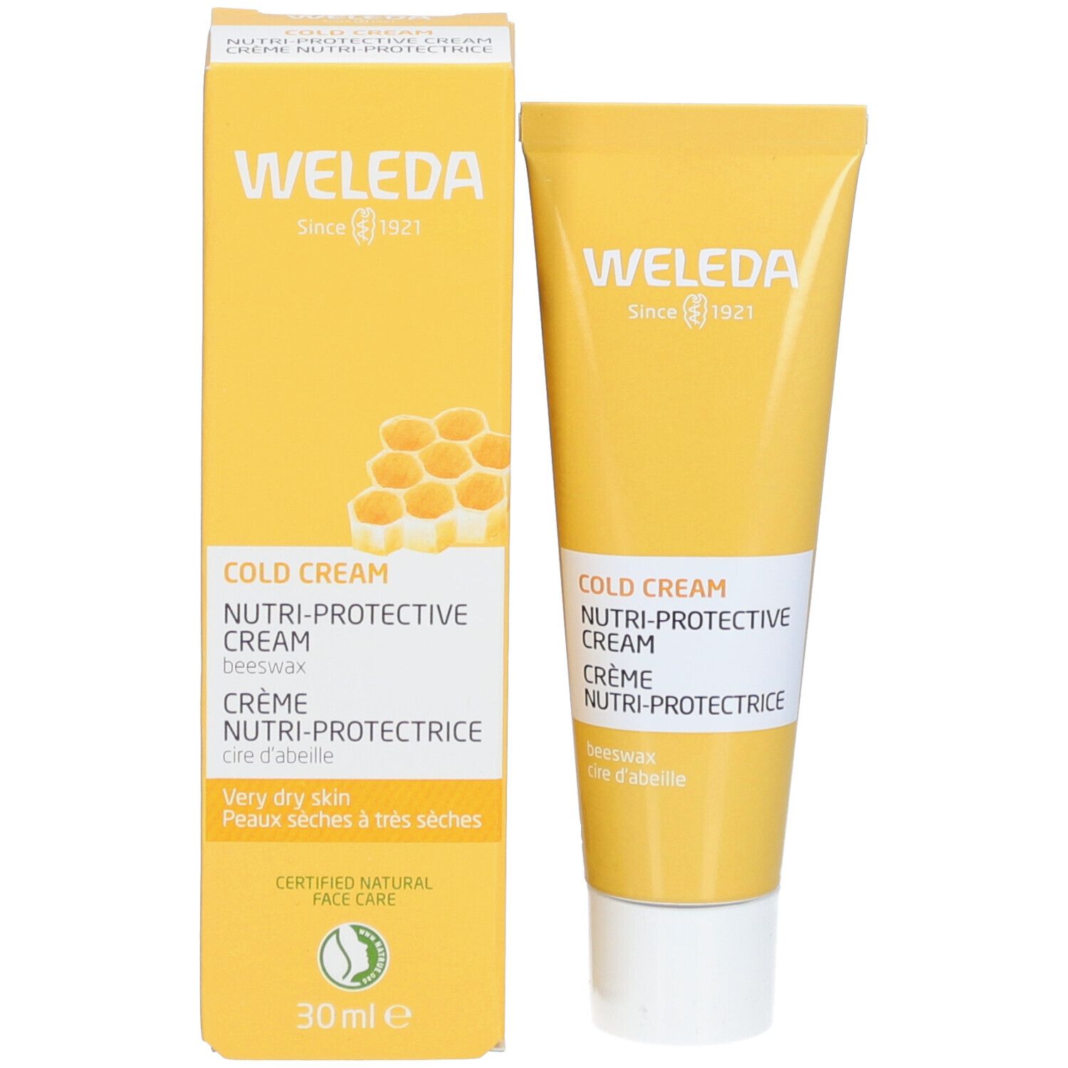 Scatola e tubo gialli. Scritte: WELEDA, Cold Cream, Nutri-Protective Cream, Crème Nutri-Protectrice. Con simbolo a nido d'ape e 30ml.