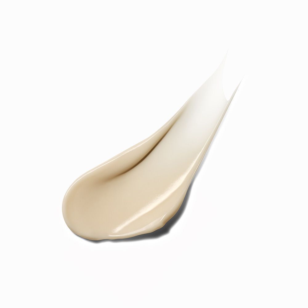 Goccia di lozione. Texture color crema. Su sfondo bianco.