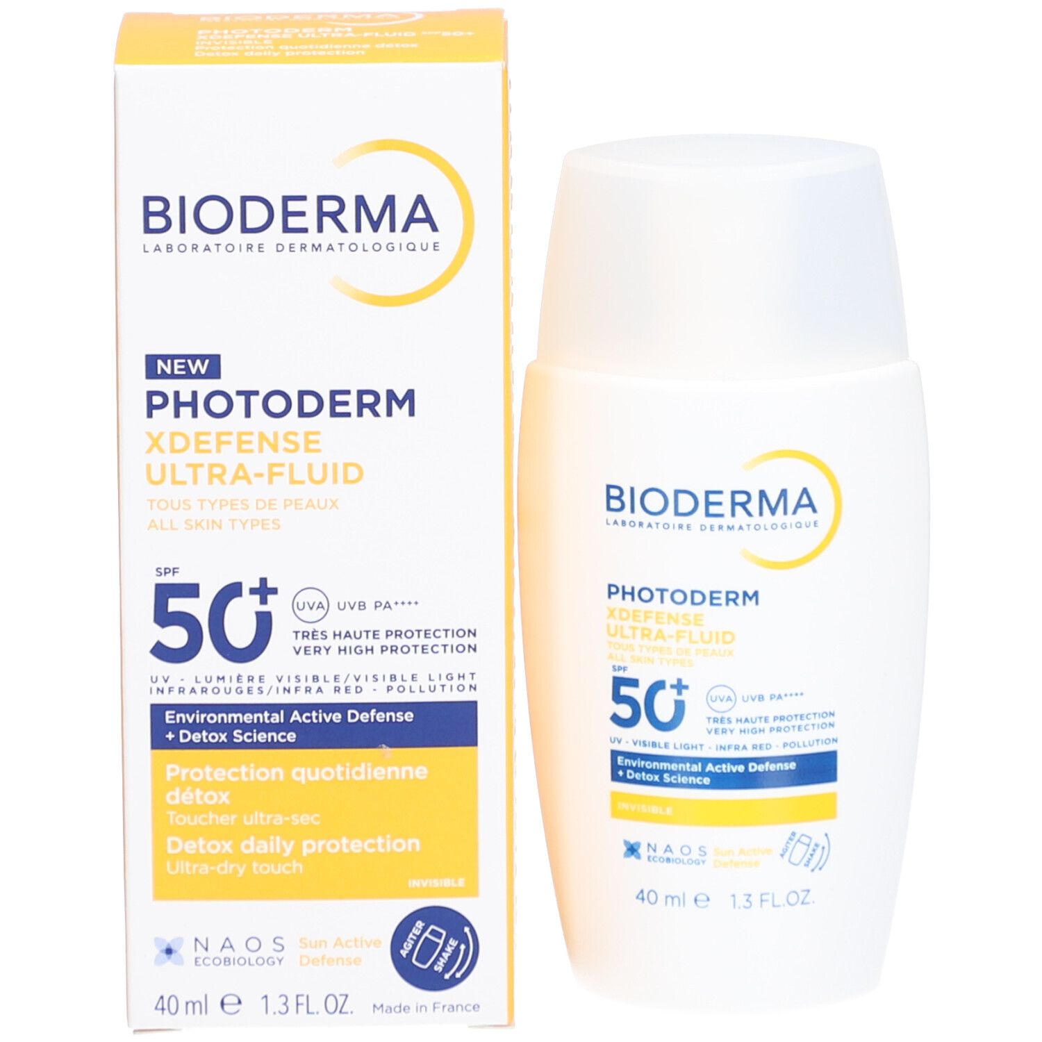 Prodotto e confezione. Flacone bianco e scatola gialla. Scritta: Bioderma, Photoderm, SPF 50+.