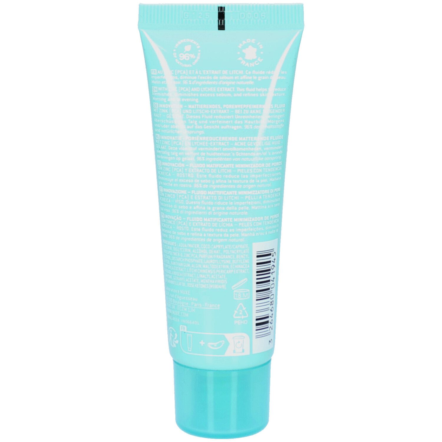 Retro di un tubo turchese. Testo bianco. Codice a barre e simboli. Marchio NUXE.