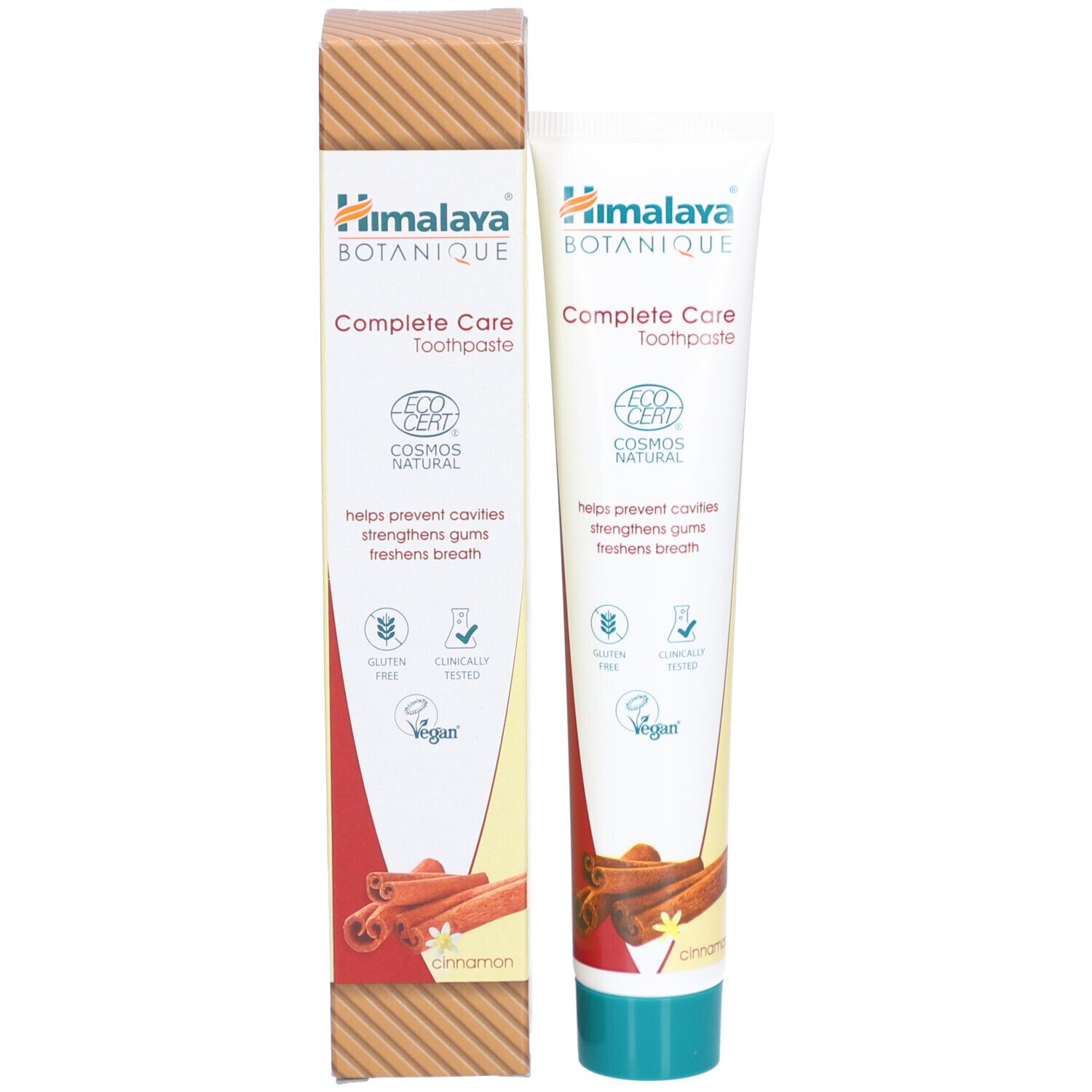 Tubo e scatola di dentifricio Himalaya Botanique Complete Care. Immagine di cannella, loghi, bianco e marrone.