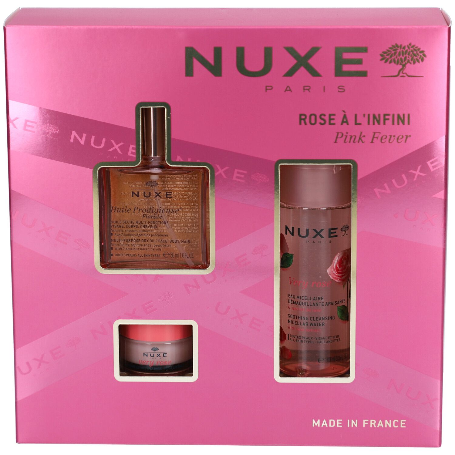 Confezione regalo rosa con tre prodotti. Visibili: logo Nuxe, nomi dei prodotti e i prodotti stessi.