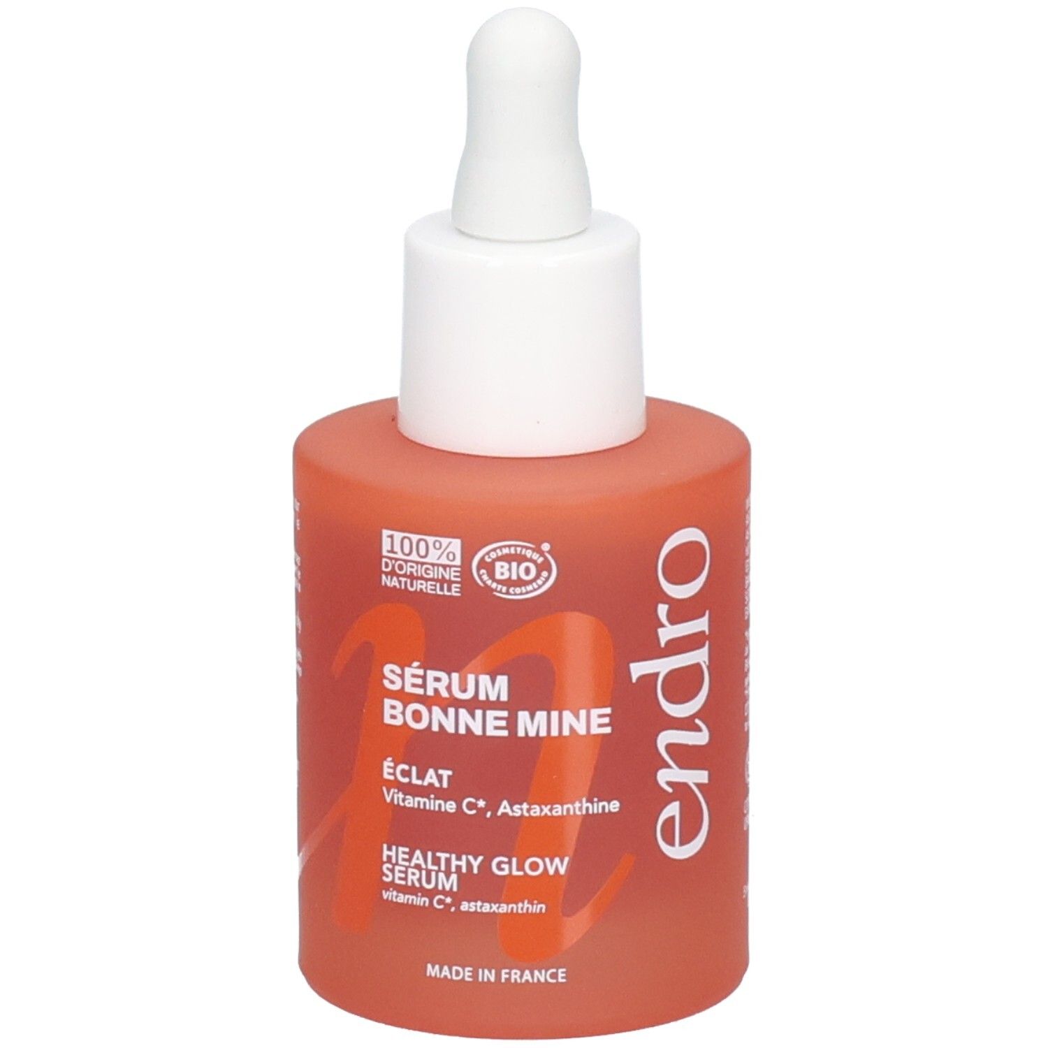 Flacone Endro Sérum Bonne Mine con contagocce. Vetro arancione con tappo bianco e scritta.