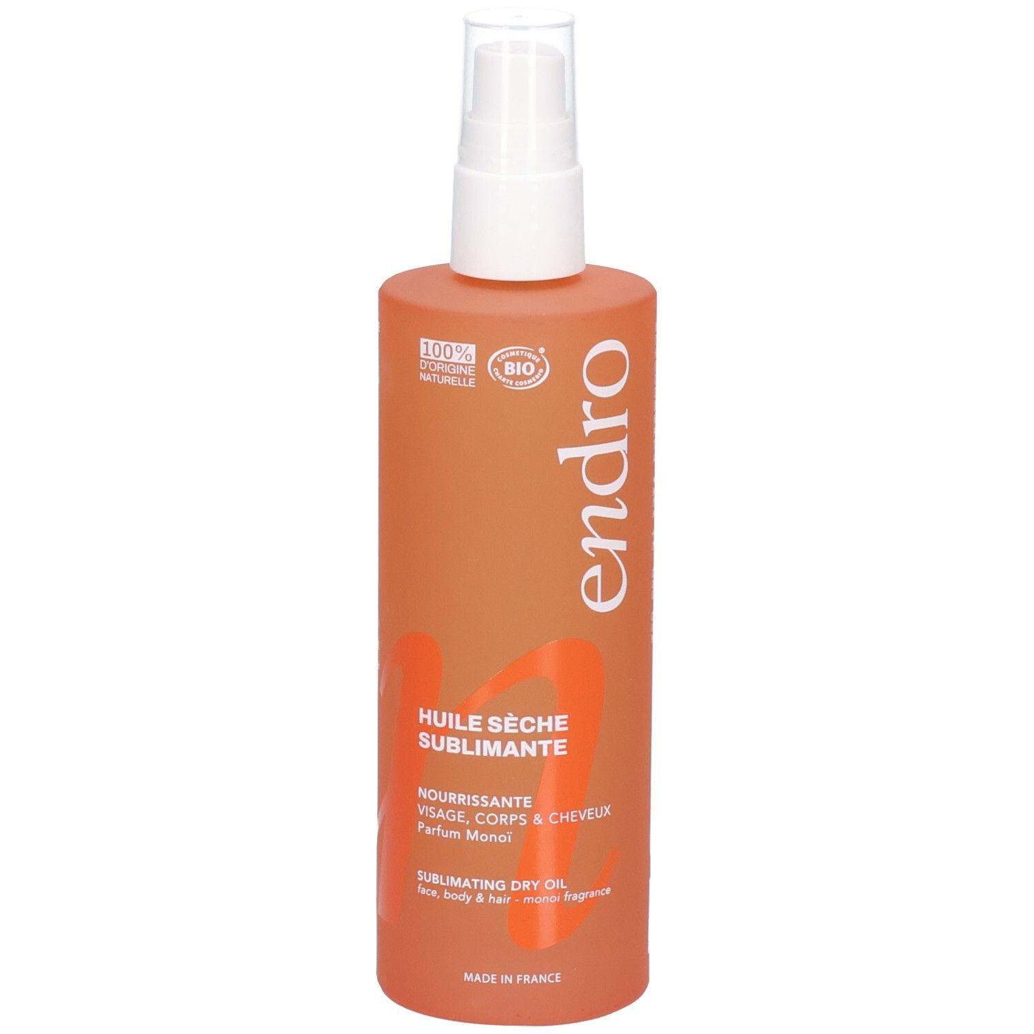 Flacone spray arancione con logo Endro e testo 'Huile Sèche Sublimante'.
