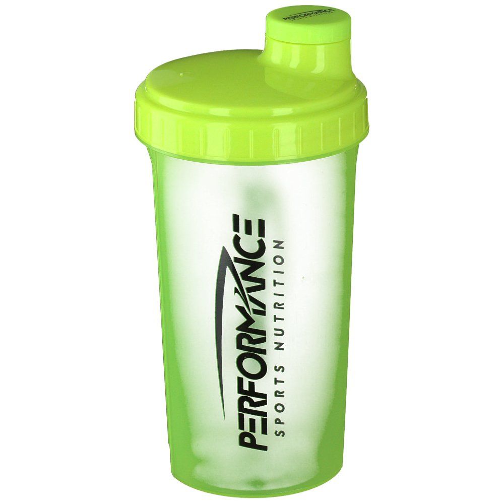 Shaker verde con coperchio. Scritta: PERFORMANCE SPORTS NUTRITION. Bicchiere trasparente.
