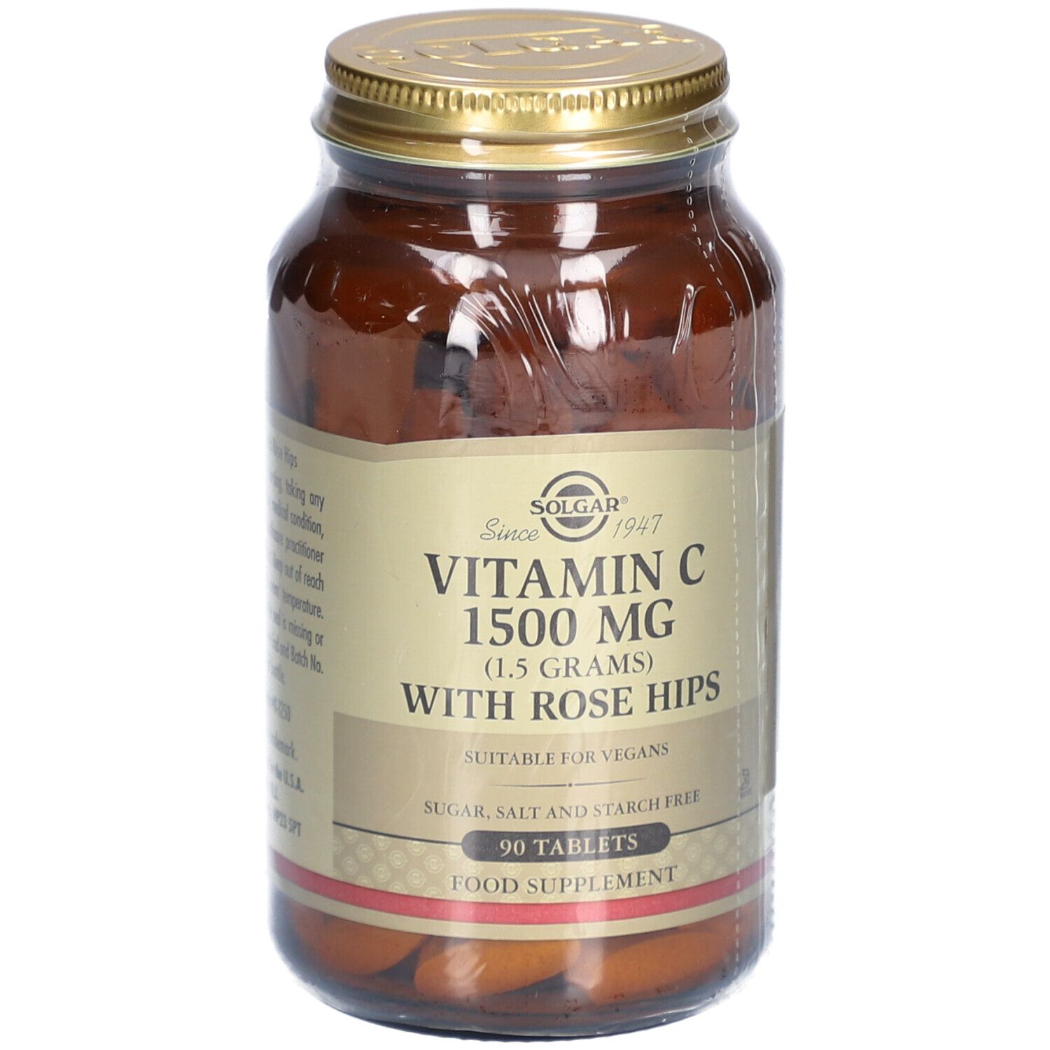Flacone di vetro marrone con tappo dorato. Etichetta con informazioni sul prodotto: Vitamina C 1500 mg con rosa canina. 90 compresse.