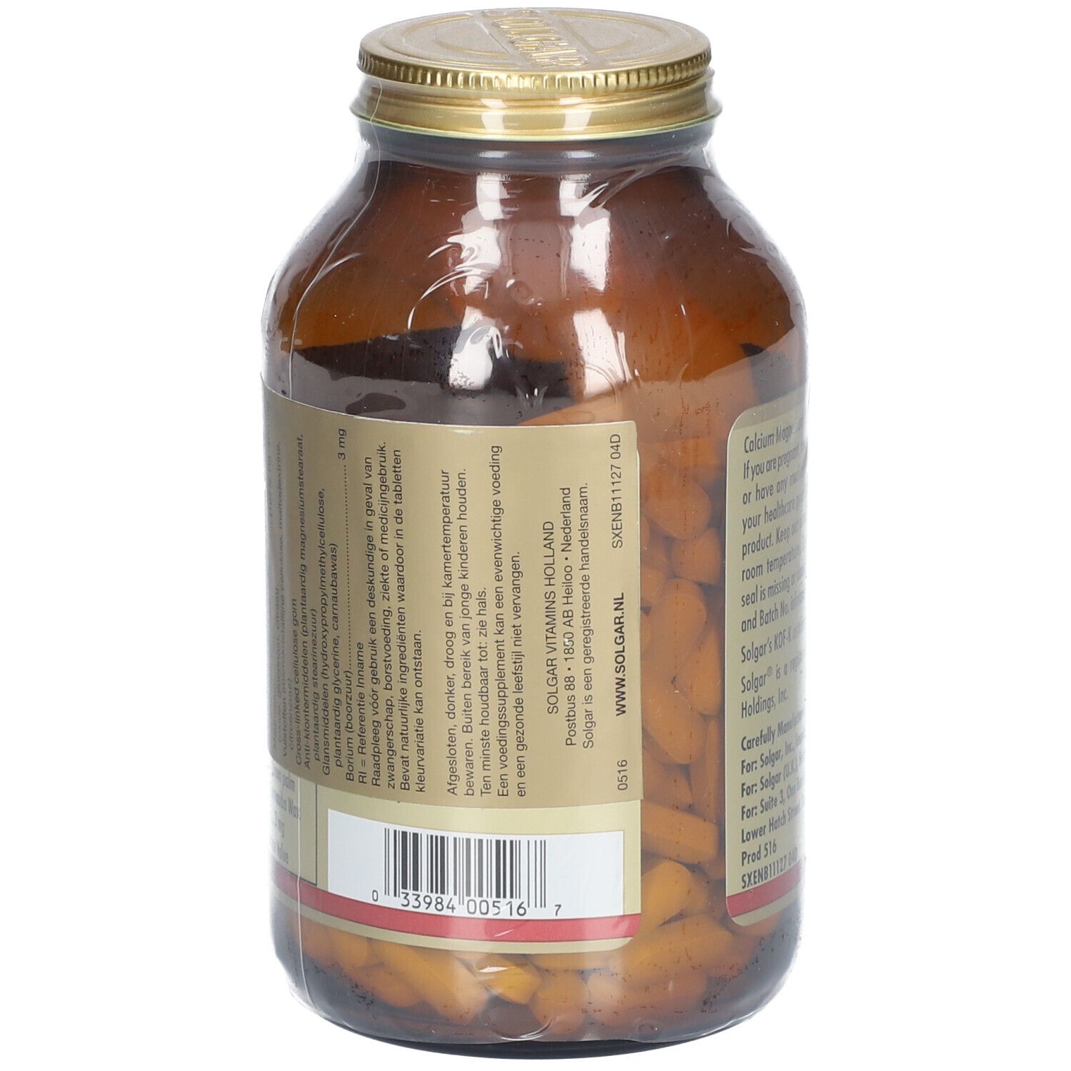 Retro di una bottiglia di vetro marrone. Etichetta con informazioni sul prodotto e dettagli del produttore. Contiene Calcium Magnesium Plus Boron.