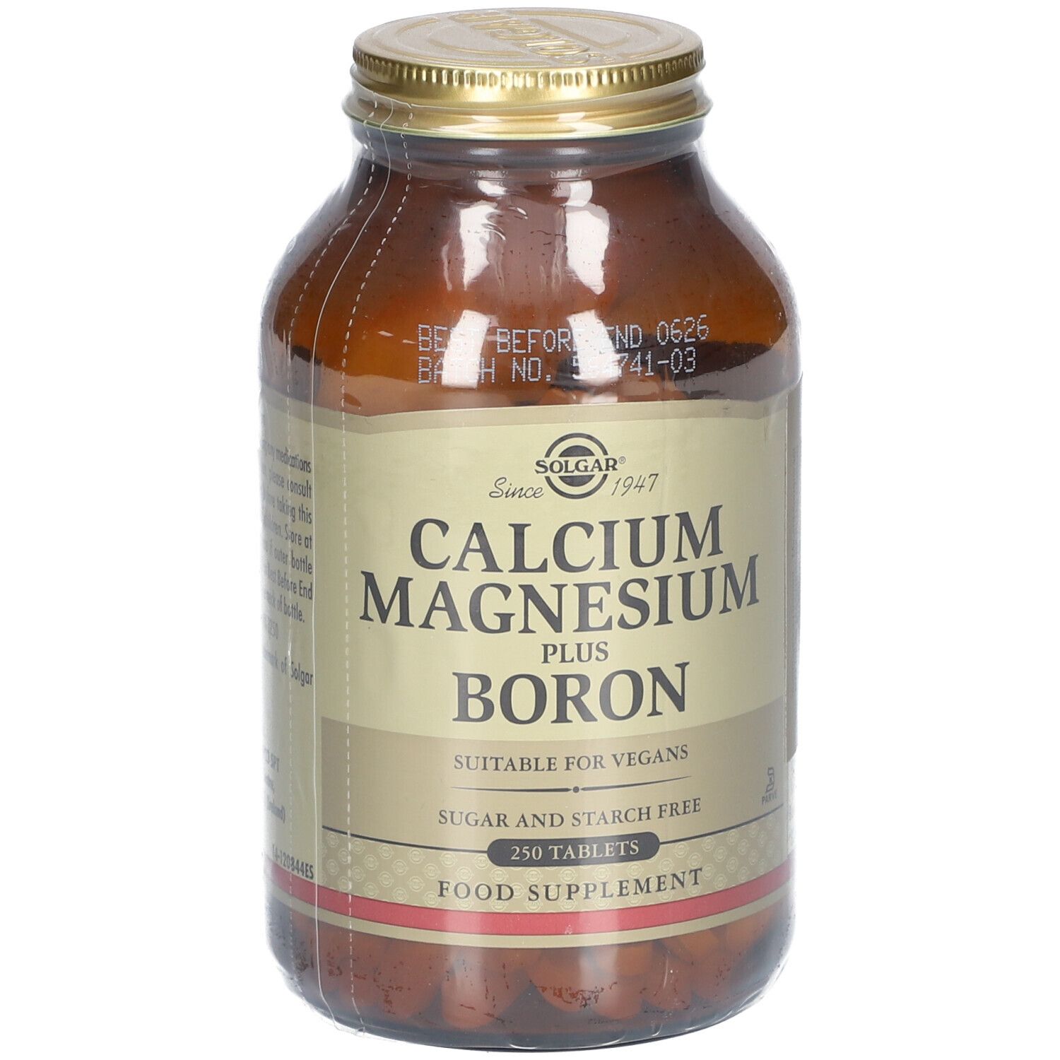 Bottiglia di vetro marrone con tappo dorato. Etichetta con nome del prodotto: Calcium Magnesium Plus Boron. 250 compresse. Adatto ai vegani.