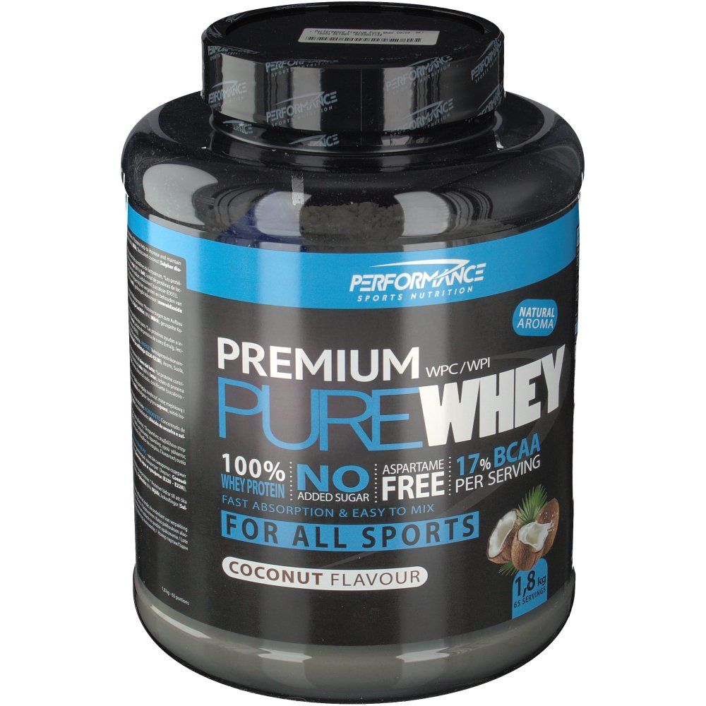 Barattolo nero con etichetta blu. Scritta: Premium Pure Whey, gusto cocco. Contiene 1,8 kg.
