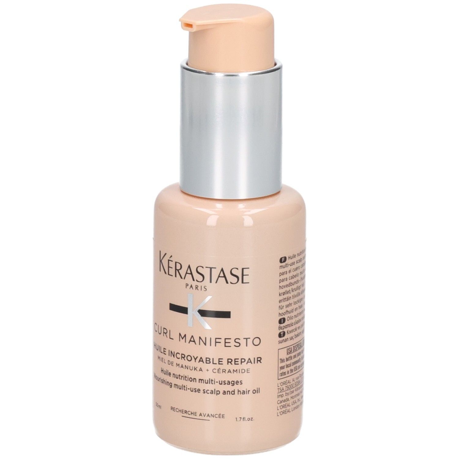 Kérastase Curl Manifesto Huile Sublime Repair, flacone con beccuccio a pompa argentato.
