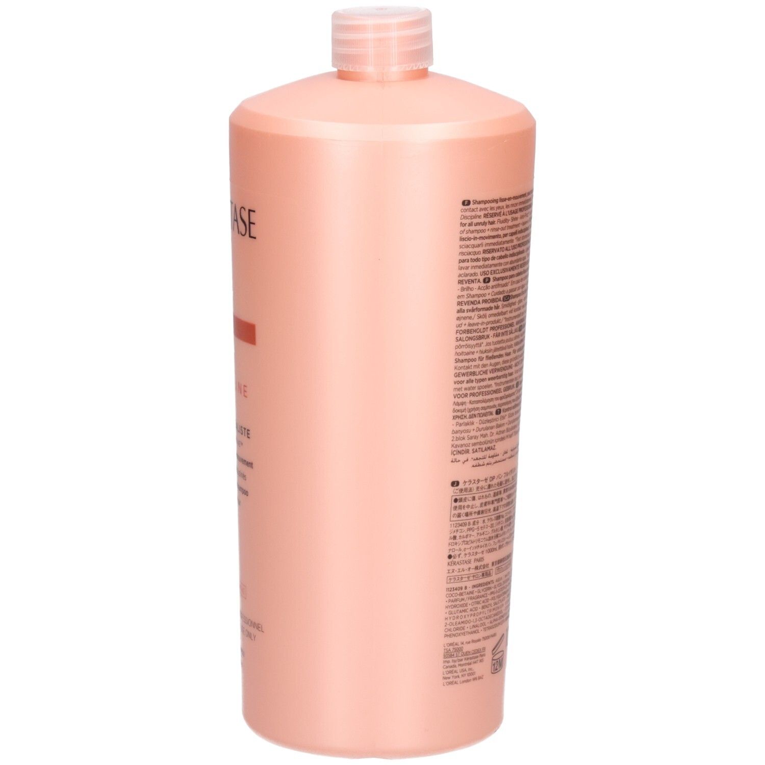 Lato del flacone di shampoo Kérastase Discipline Bain Fluidealiste con testo.