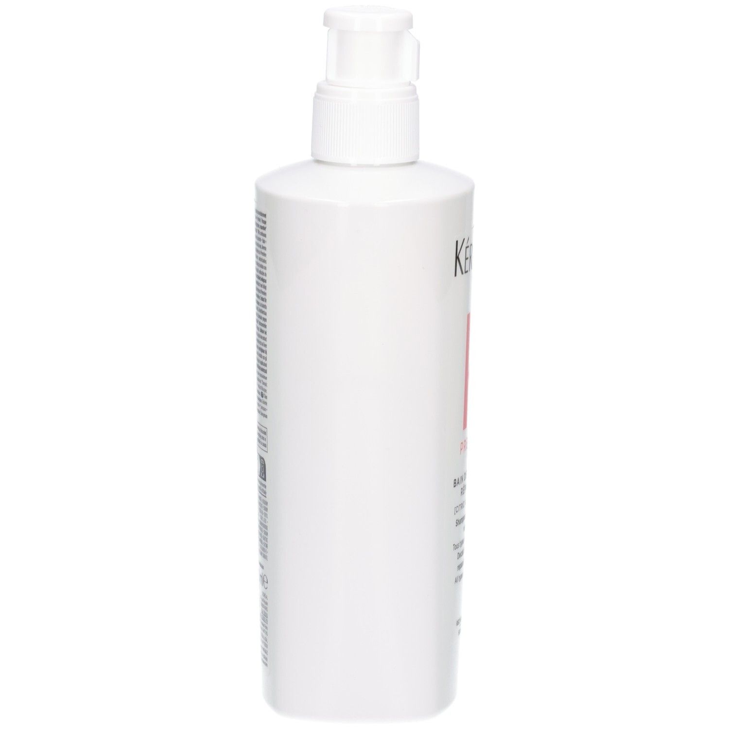 Vista laterale del flacone di shampoo bianco Kérastase con erogatore a pompa.