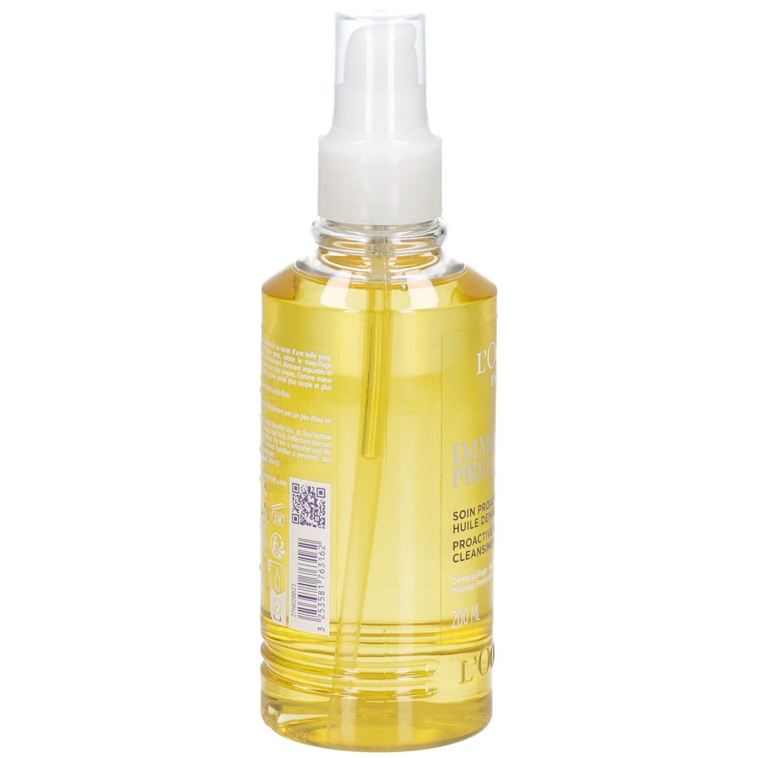 Retro dell'olio detergente L'OCCITANE Immortelle in flacone spray trasparente con olio giallo.
