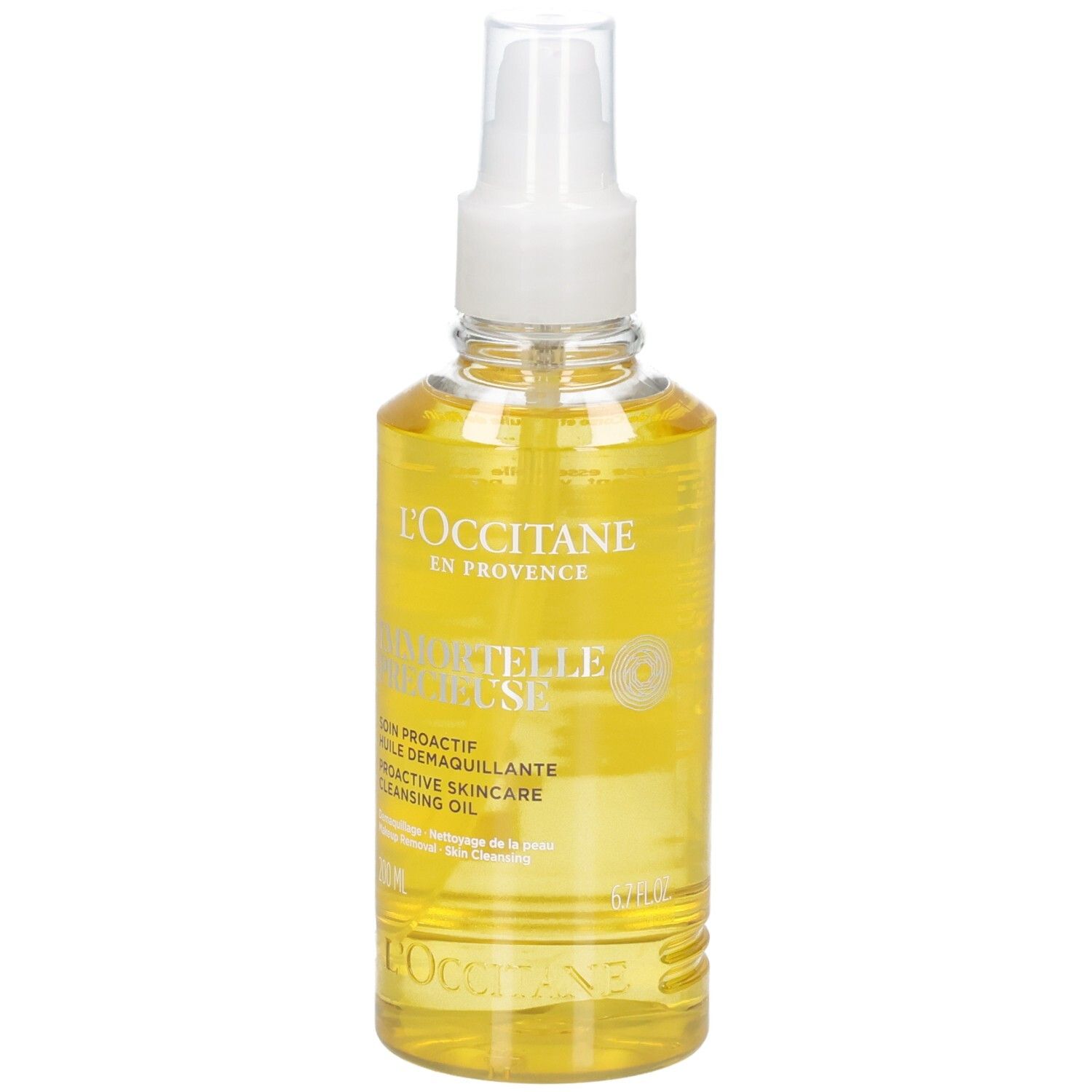 Olio detergente L'OCCITANE Immortelle in flacone spray trasparente con olio giallo.