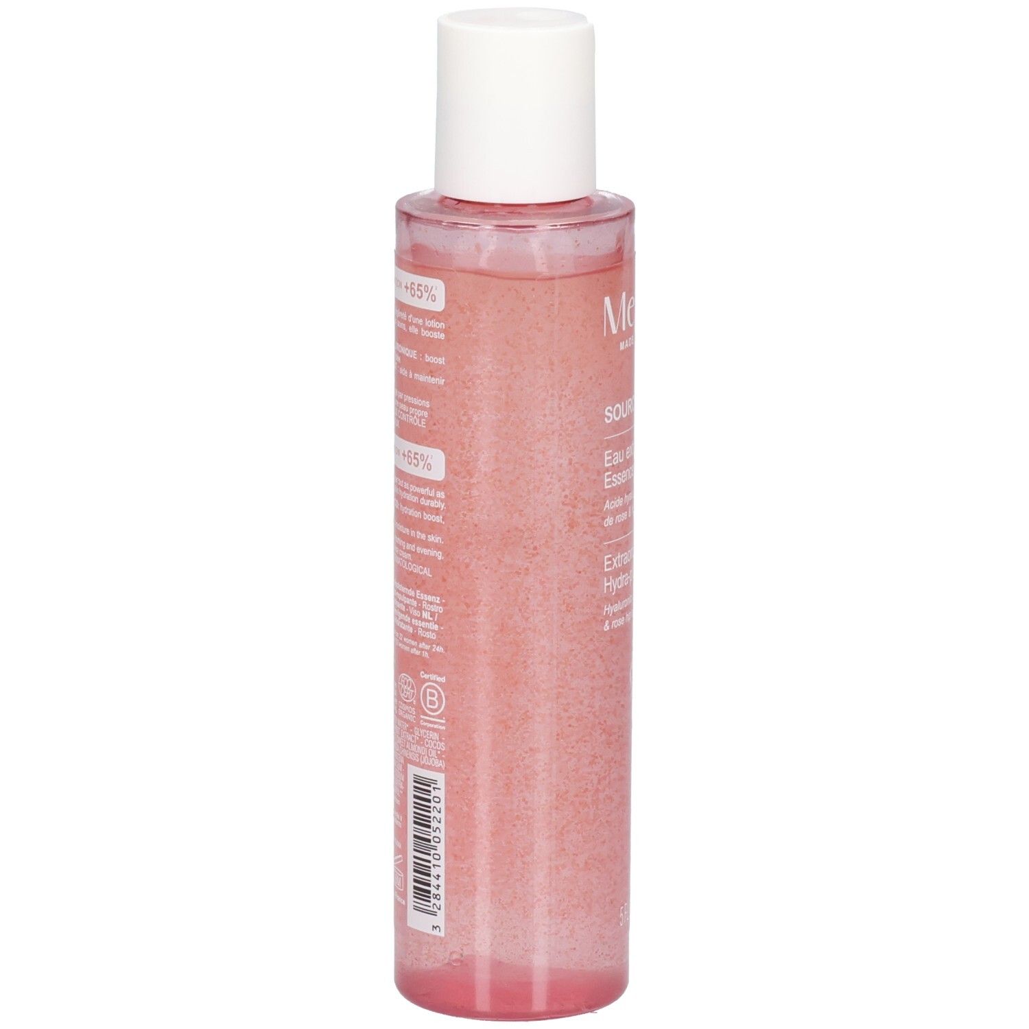 Vista posteriore del flacone di essenza di rosa. Informazioni testuali sull'etichetta. Flacone trasparente con liquido rosa e tappo bianco.