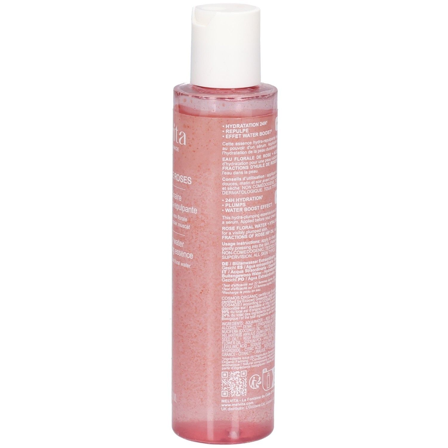 Vista posteriore del flacone di essenza di rosa. Informazioni testuali sull'etichetta. Flacone trasparente con liquido rosa e tappo bianco.