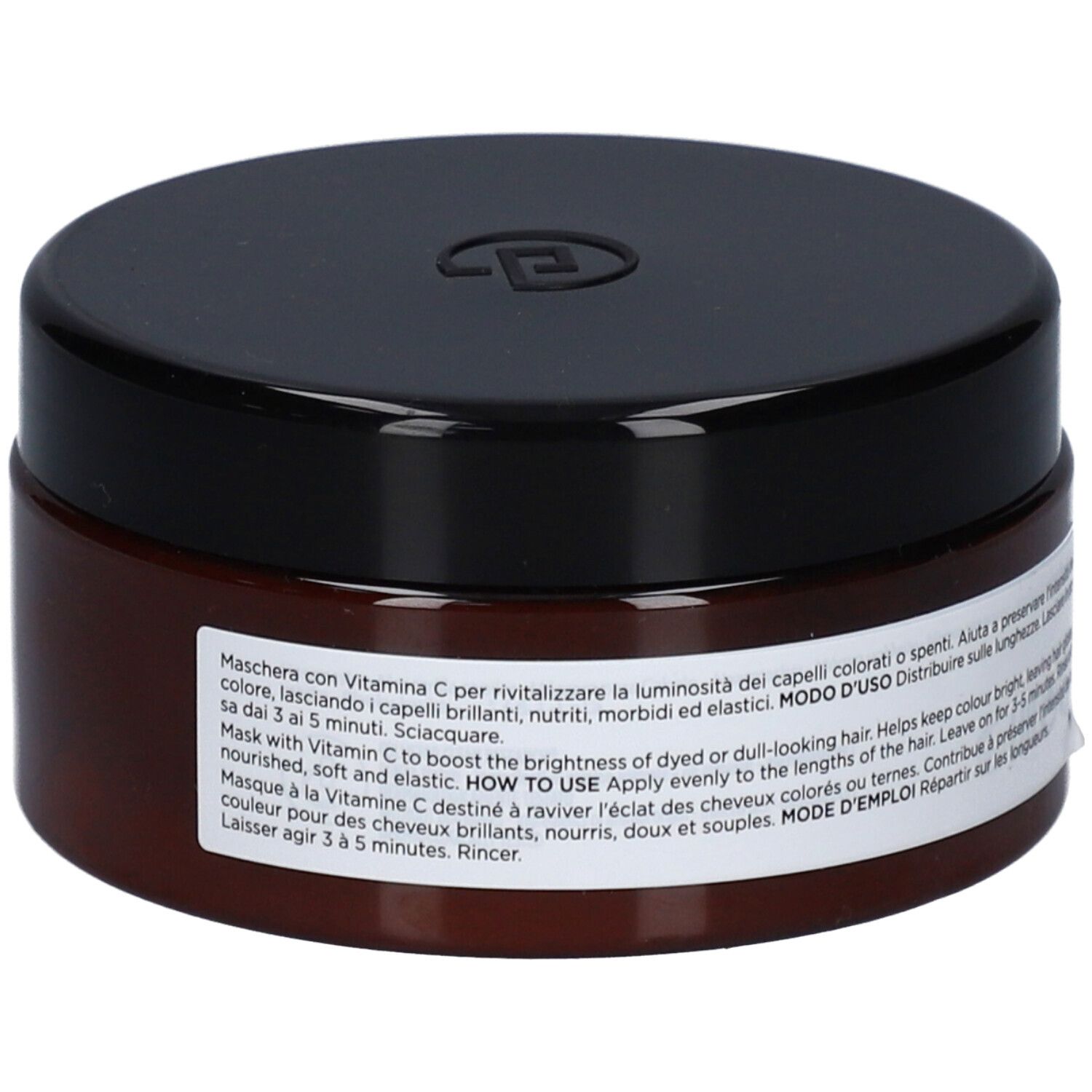 Barattolo marrone con coperchio nero. Etichetta con testo: Collistar Masque Vitamin C. Per capelli colorati. Retro.
