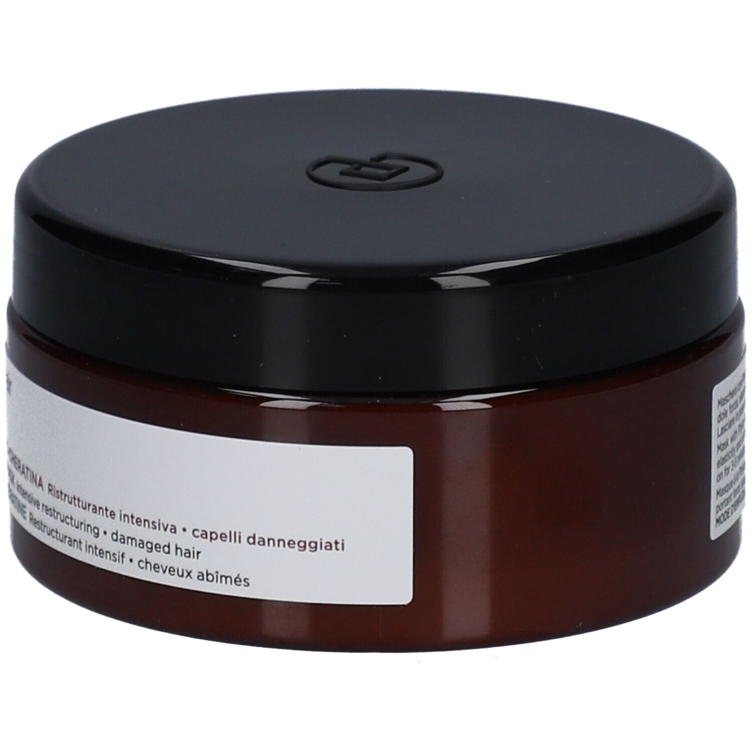 Barattolo marrone con coperchio nero. Scritta: Maschera Phyto-Cheratina, per capelli danneggiati.