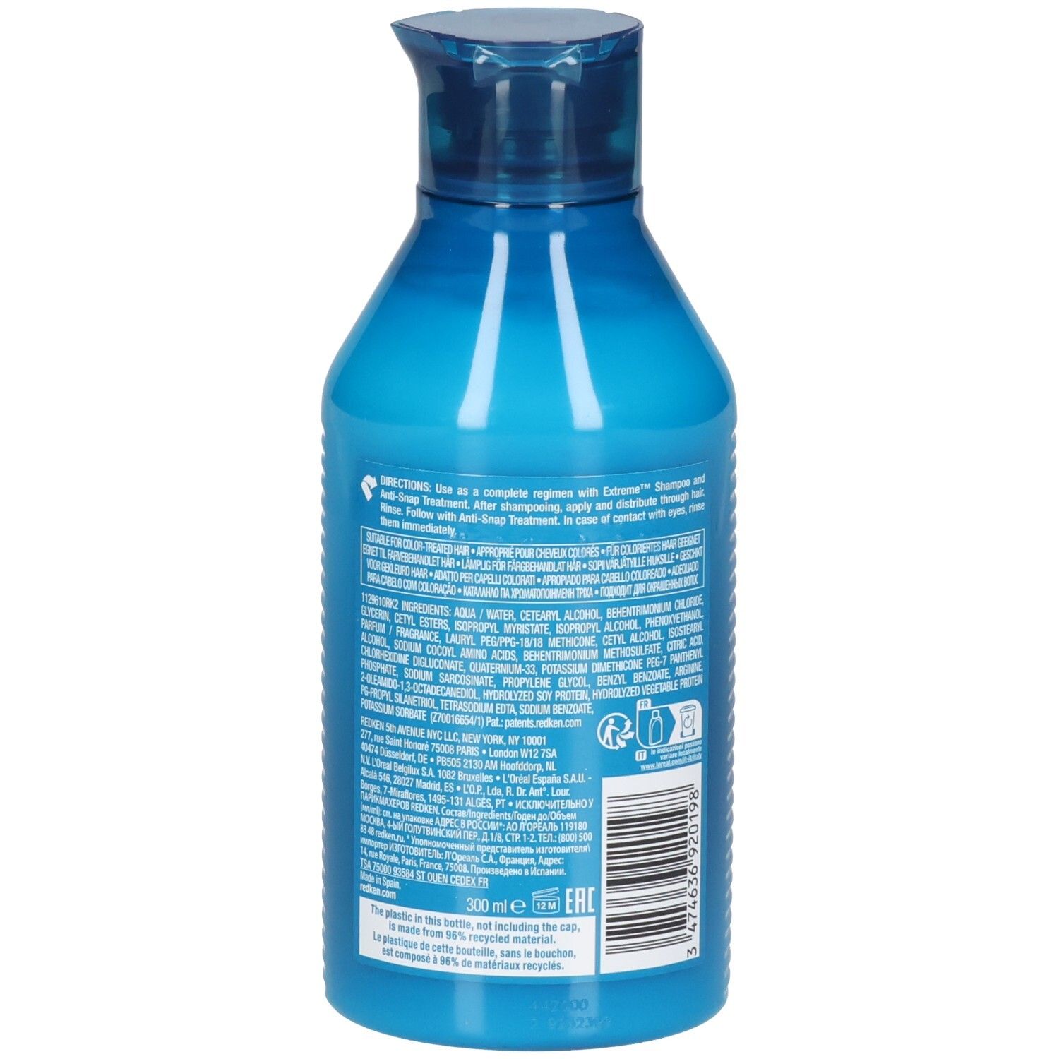 Retro di un flacone blu-turchese. Contiene testo e codice a barre. Scritta: Redken Extreme Conditioner. 300ml. Fabbricato con materiale riciclato.