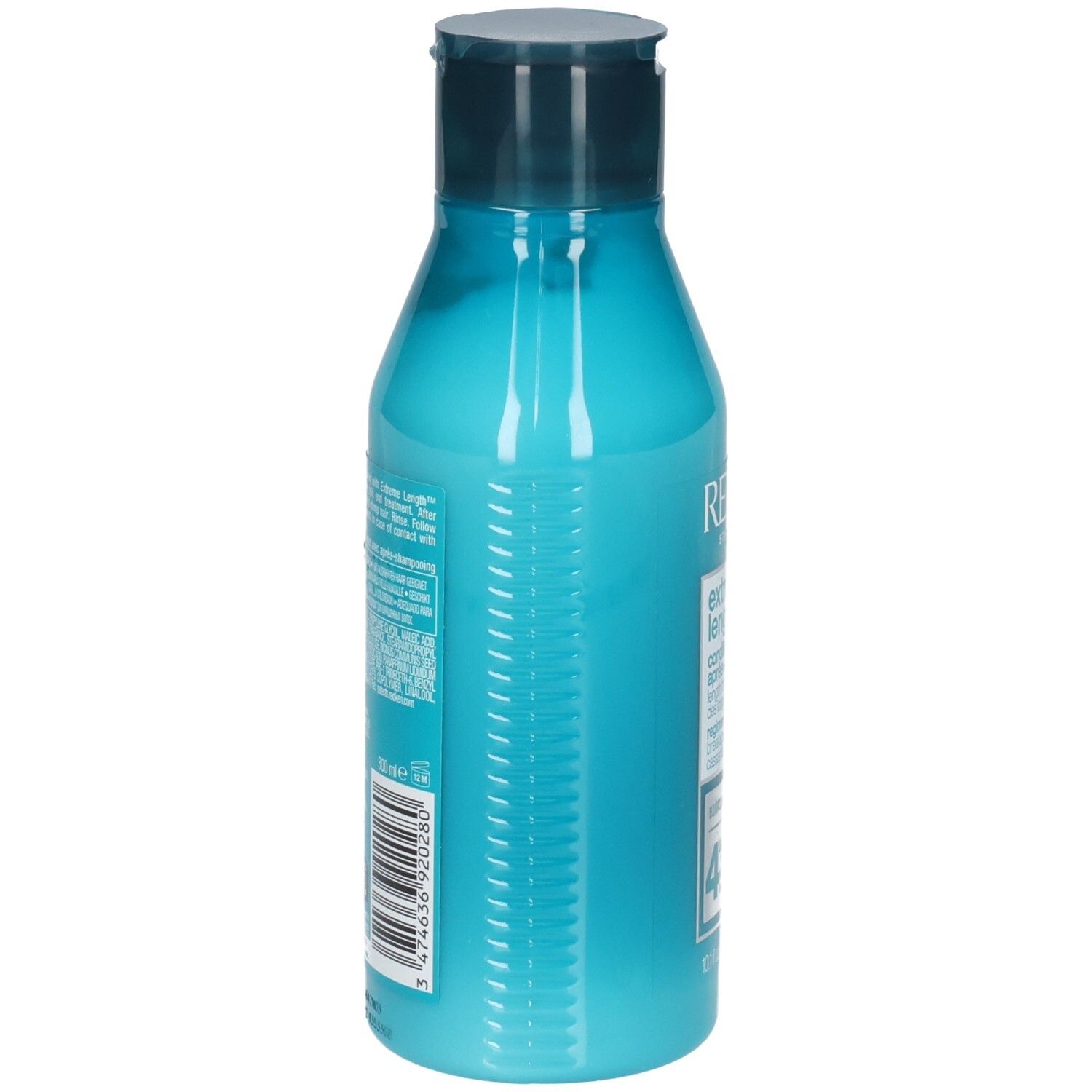 Retro di un flacone turchese con tappo blu scuro. Codice a barre e informazioni testuali. Contiene REDKEN Extreme Length Conditioner.