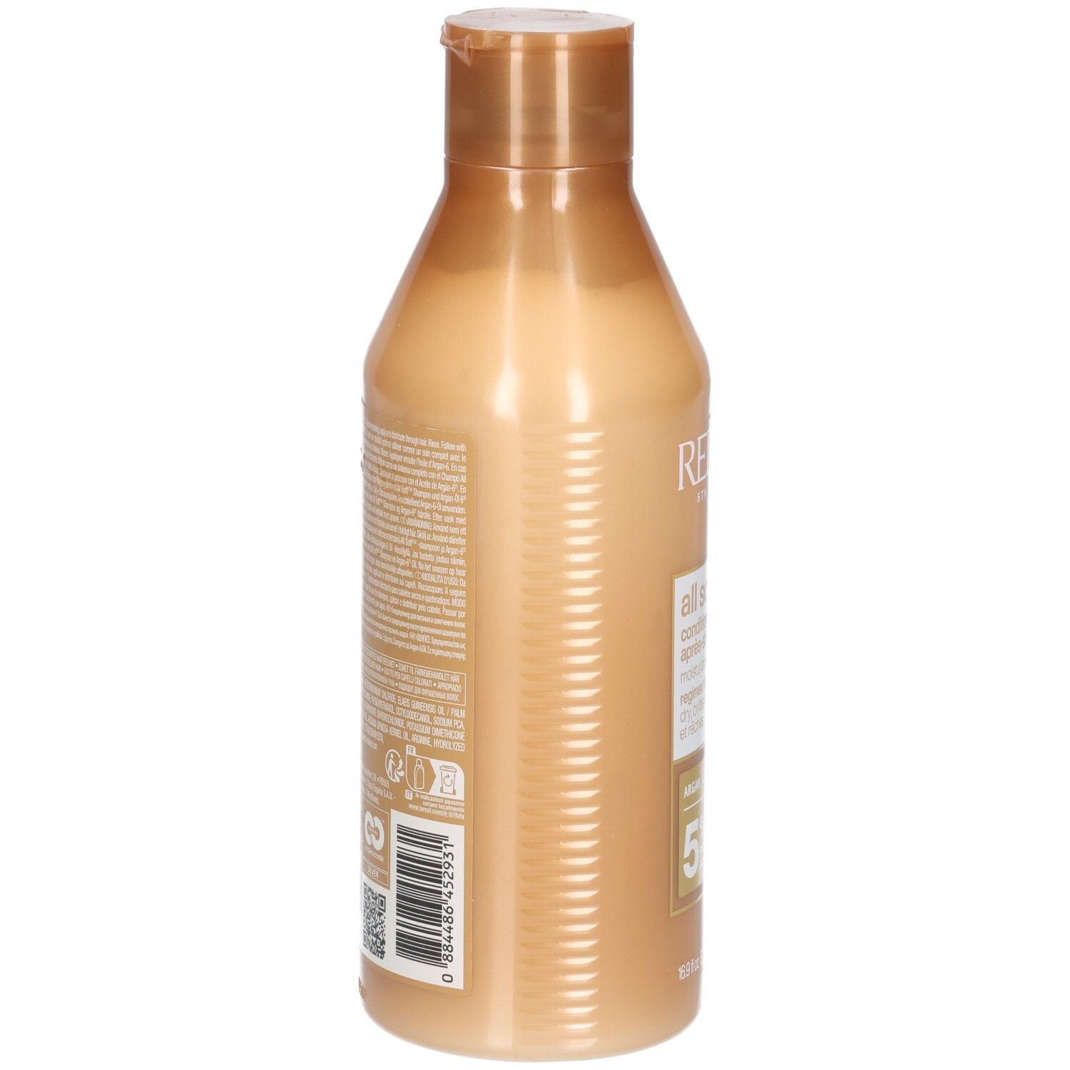Retro di un flacone di balsamo dorato. Testo e codice a barre sull'etichetta.