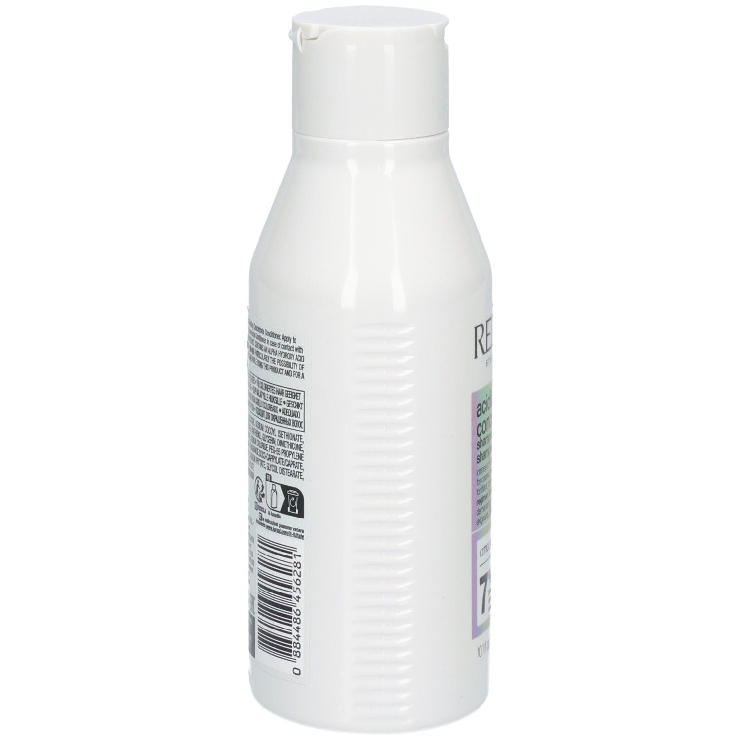 Flacone di shampoo bianco. Retro con testo e codice a barre. Marca: Redken. 300ml.